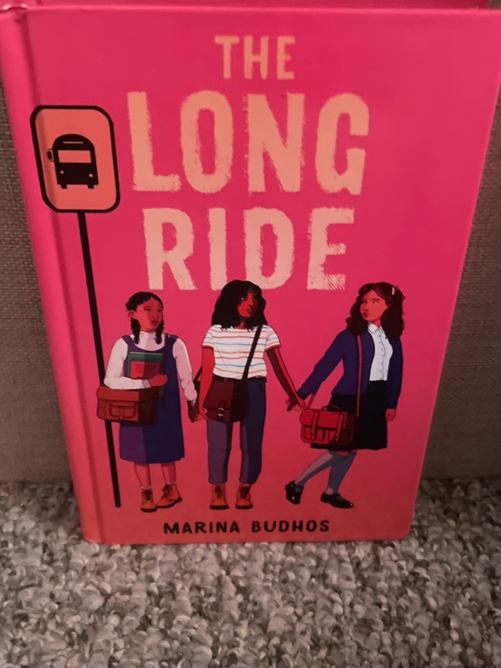 The Long Ride - Pink Hardcover Book by Marina Budhos